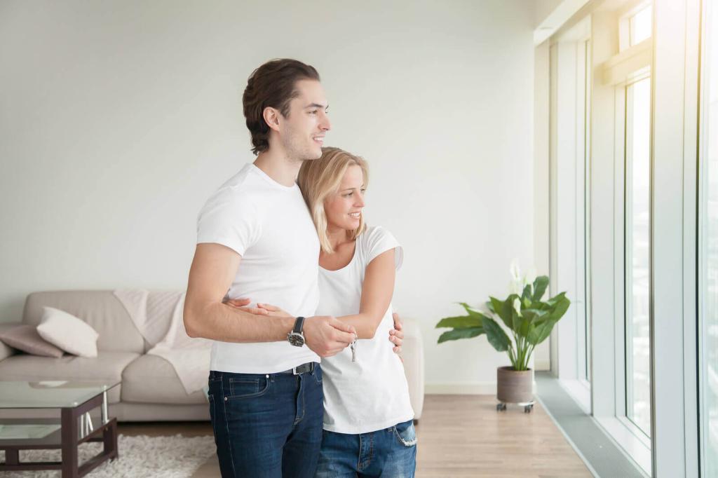 ein junges Paar in ihrer neuen Wohnung